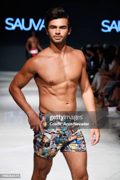 Model walks the runway for Sauvage Swimwear at Miami Swim Week powered by Art Hearts Fashion Swim/Resort 2018/19 at Faena Forum on July 13, 2018 in...