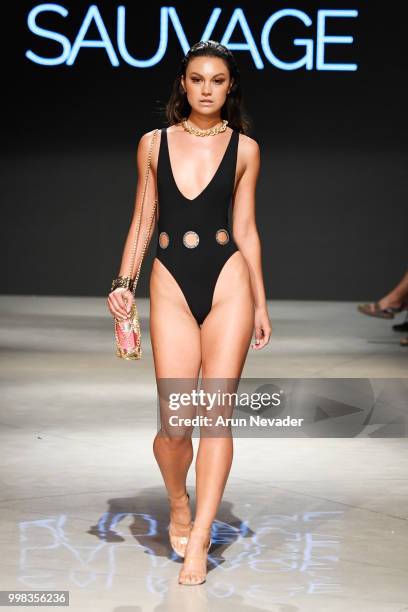 Model walks the runway for Sauvage Swimwear at Miami Swim Week powered by Art Hearts Fashion Swim/Resort 2018/19 at Faena Forum on July 13, 2018 in...