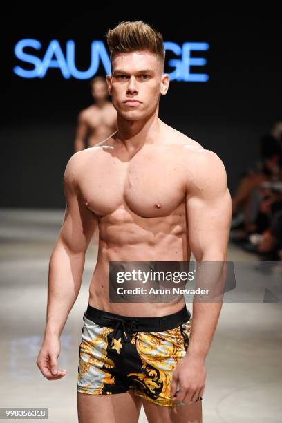 Model walks the runway for Sauvage Swimwear at Miami Swim Week powered by Art Hearts Fashion Swim/Resort 2018/19 at Faena Forum on July 13, 2018 in...