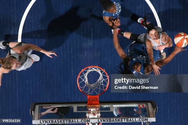 Sylvia Fowles of the Minnesota Lynx and Kelsey Plum of the Las Vegas Aces compete for the ball on July 13, 2018 at Target Center in Minneapolis,...