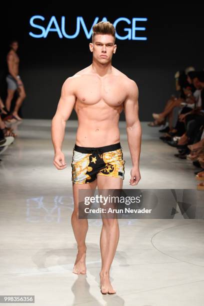 Model walks the runway for Sauvage Swimwear at Miami Swim Week powered by Art Hearts Fashion Swim/Resort 2018/19 at Faena Forum on July 13, 2018 in...