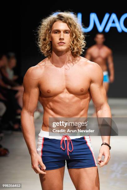 Model walks the runway for Sauvage Swimwear at Miami Swim Week powered by Art Hearts Fashion Swim/Resort 2018/19 at Faena Forum on July 13, 2018 in...