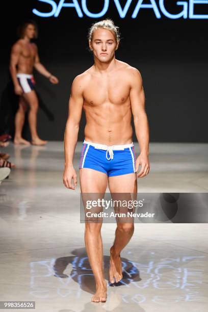 Model walks the runway for Sauvage Swimwear at Miami Swim Week powered by Art Hearts Fashion Swim/Resort 2018/19 at Faena Forum on July 13, 2018 in...