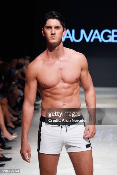 Model walks the runway for Sauvage Swimwear at Miami Swim Week powered by Art Hearts Fashion Swim/Resort 2018/19 at Faena Forum on July 13, 2018 in...