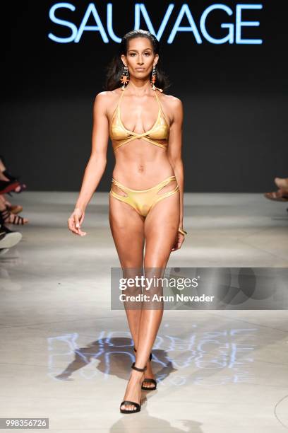 Model walks the runway for Sauvage Swimwear at Miami Swim Week powered by Art Hearts Fashion Swim/Resort 2018/19 at Faena Forum on July 13, 2018 in...