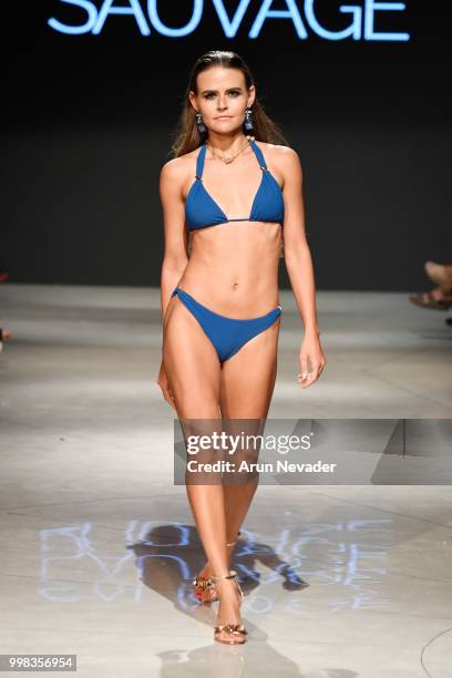 Model walks the runway for Sauvage Swimwear at Miami Swim Week powered by Art Hearts Fashion Swim/Resort 2018/19 at Faena Forum on July 13, 2018 in...