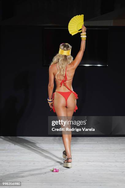 Georgia Gibbs walks the runway for iSHINE365 during the Paraiso Fashion Fair at The Paraiso Tent on July 13, 2018 in Miami Beach, Florida.