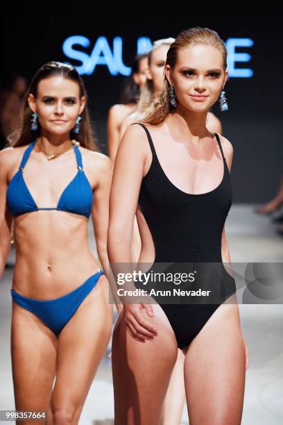 Models walk the runway for Sauvage Swimwear at Miami Swim Week powered by Art Hearts Fashion Swim/Resort 2018/19 at Faena Forum on July 13, 2018 in...