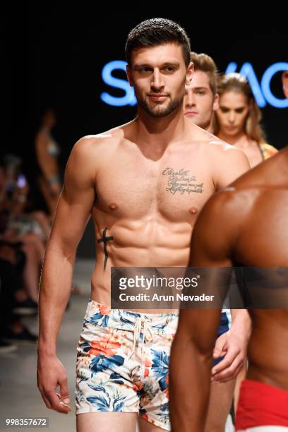 Models walk the runway for Sauvage Swimwear at Miami Swim Week powered by Art Hearts Fashion Swim/Resort 2018/19 at Faena Forum on July 13, 2018 in...