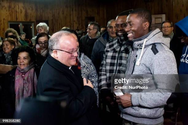 Monsignor Scicluna,the main expert on sexual crimes of the Vatican, greets two Haitian immigrants in Osorno, Chile, on 15 July 2018. Monsignor...