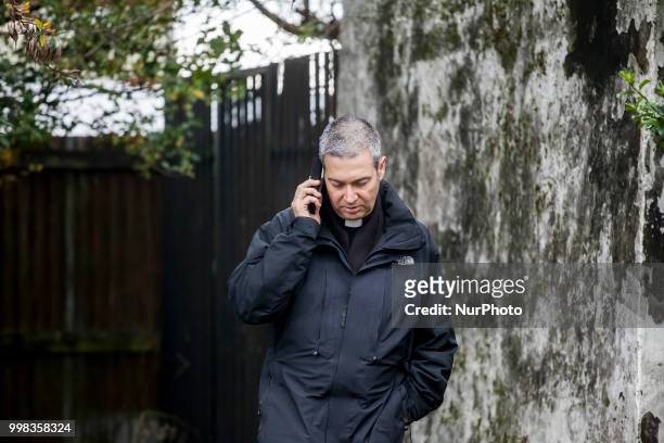 Monsignor Jordi Bertomeu, official of the Congregation for the Doctrine of the Faith, in Osorno, Chile, on 15 July 2018, talks on cell phone with the...