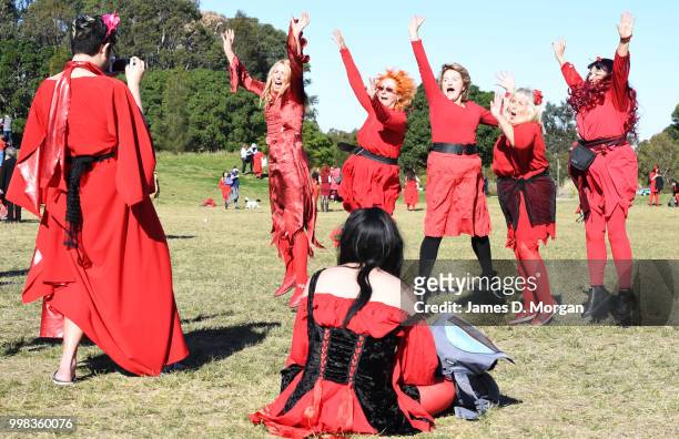 Man photographs a group of fans of Kate Bush on July 14, 2018 in Sydney, Australia. The Most Wuthering Heights Day is when people all around the...