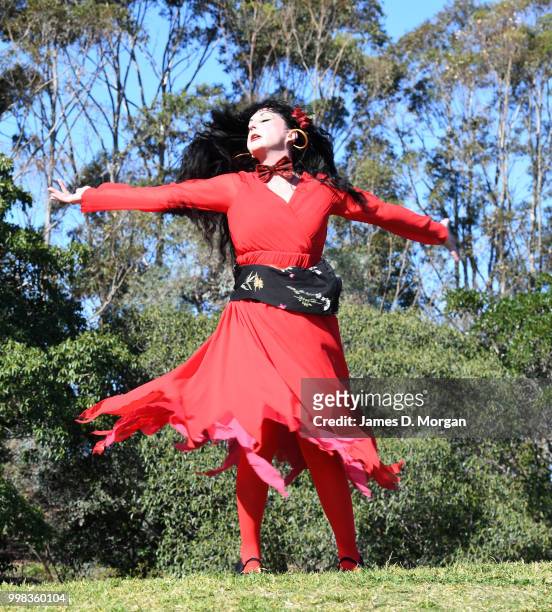 Woman dressed as Kate Bush joins with hundreds of others on July 14, 2018 in Sydney, Australia. The Most Wuthering Heights Day is when people all...