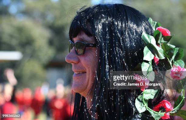 Man dressed as Kate Bush in a park with hundreds of others on July 14, 2018 in Sydney, Australia. The Most Wuthering Heights Day is when people all...