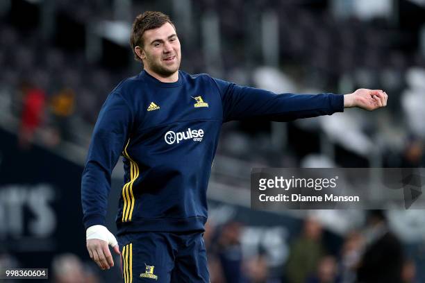 Liam Squire of the Highlanders warms up ahead of the round 19 Super Rugby match between the Highlanders and the Rebels at Forsyth Barr Stadium on...