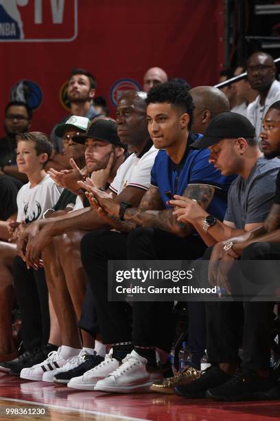 Magic Johnson President of Basketball Operations and Kyle Kuzma of the Los Angeles Lakers are seen during the game against the New York Knicks during...