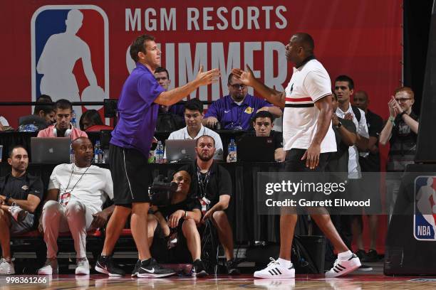 Head Coach Luke Walton and President of Basketball Operations Magic Johnson of the Los Angeles Lakers look on during the game against the New York...