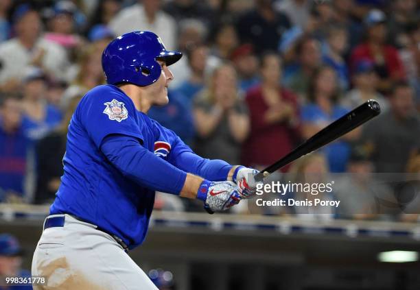 Anthony Rizzo of the Chicago Cubs hits an RBI double during the ninth inning of a baseball game against the San Diego Padres at PETCO Park on July...