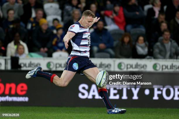 Reece Hodge of the Rebels kicks the ball during the round 19 Super Rugby match between the Highlanders and the Rebels at Forsyth Barr Stadium on July...