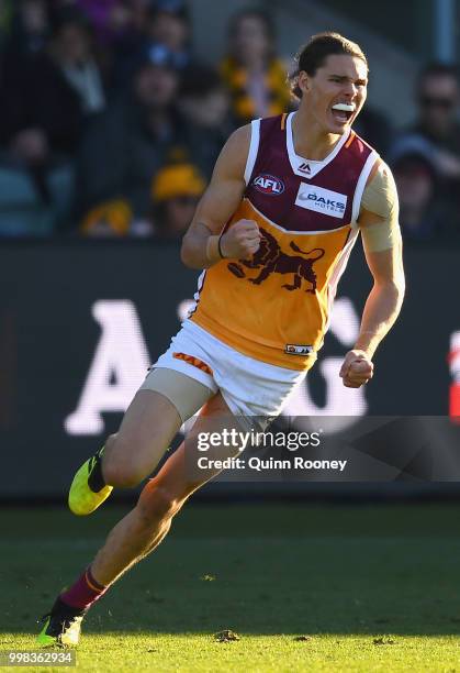 Eric Hipwood of the Lions celebrates kicking a goal during the round 17 AFL match between the Hawthorn Hawks and the Brisbane Lions at University of...