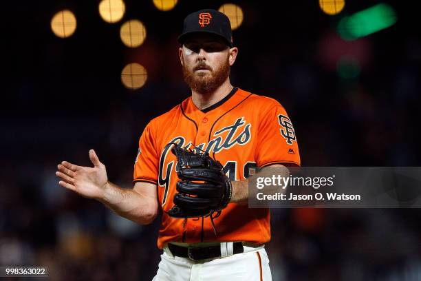 Sam Dyson of the San Francisco Giants celebrates after the game against the Oakland Athletics at AT&T Park on July 13, 2018 in San Francisco,...