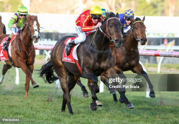 Voodoo Lad ridden by Brad Rawiller wins the Ladbrokes Sir John Monash Stakes at Caulfield Racecourse on July 14, 2018 in Caulfield, Australia.