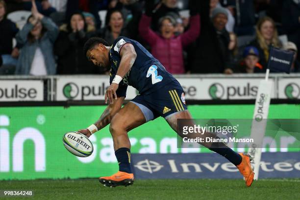 Waisake Naholo of the Highlanders scores a try during the round 19 Super Rugby match between the Highlanders and the Rebels at Forsyth Barr Stadium...