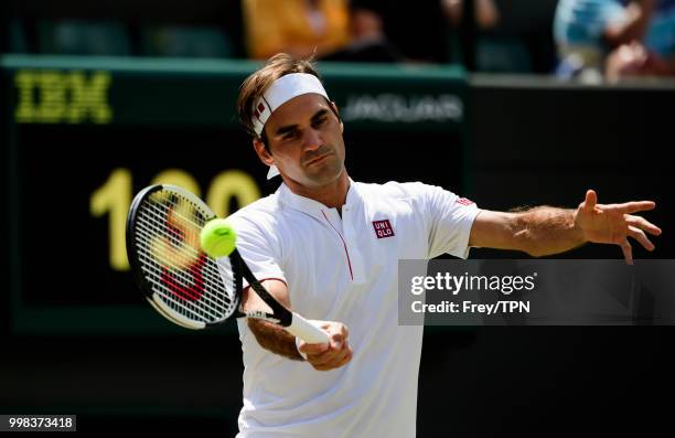 Roger Federer of Switzerland in action against Kevin Anderson of South Africa in the gentlemen's quarter finals at the All England Lawn Tennis and...