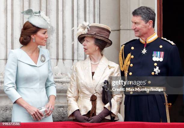 Catherine, Duchess of Cambridge, Princess Anne, Princess Royal and Vice Admiral Sir Tim Laurence watch a flypast to mark the centenary of the Royal...