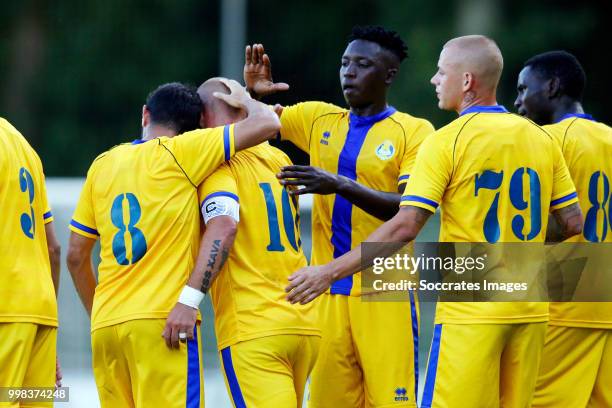 Wesley Sneijder of Al Gharafa celebrates 1-1 with Tameem Al Muhaza of Al Gharafa, Yousuf Muftah of Al Gharafa, Saeed Alhaj Essa of Al Gharafa,...