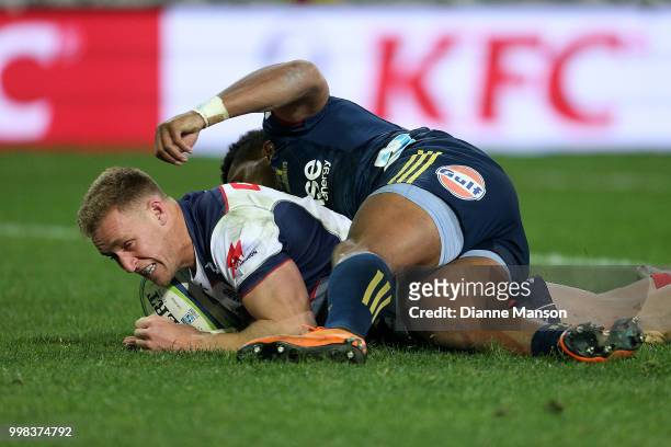 Reece Hodge of the Rebels scores a try during the round 19 Super Rugby match between the Highlanders and the Rebels at Forsyth Barr Stadium on July...
