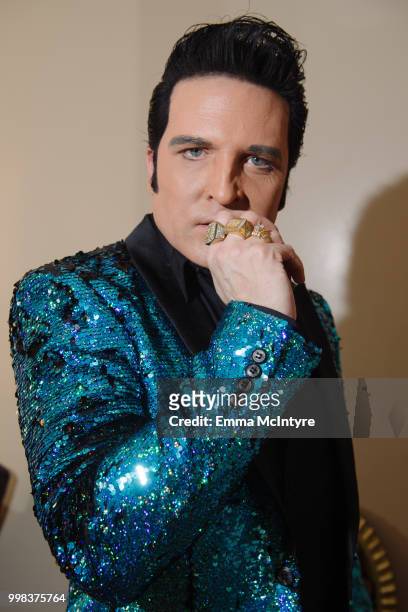 Elvis Presley impersonator Dwight Icenhower attends the Las Vegas Elvis Festival at Sam's Town Hotel & Gambling Hall on July 13, 2018 in Las Vegas,...