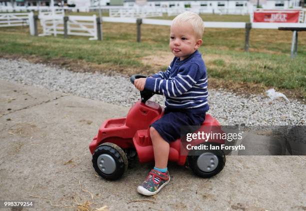 George Barker from Kirby Moorside drives his toy tractor during the final day of the 160th Great Yorkshire Show on July 12, 2018 in Harrogate,...