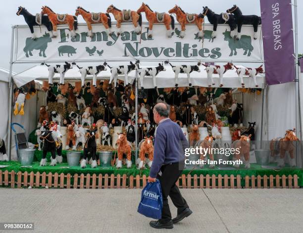 Man walks past a stall selling cuddly toys during the final day of the 160th Great Yorkshire Show on July 12, 2018 in Harrogate, England. First held...