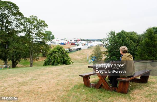 Woman sits having her breakfast during the final day of the 160th Great Yorkshire Show on July 12, 2018 in Harrogate, England. First held in 1838 the...