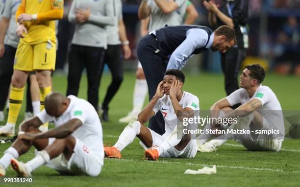 Jordan Henderson of England Jesse Lingard of England John Stones of England Coach Gareth Southgate of England during the 2018 FIFA World Cup Russia...