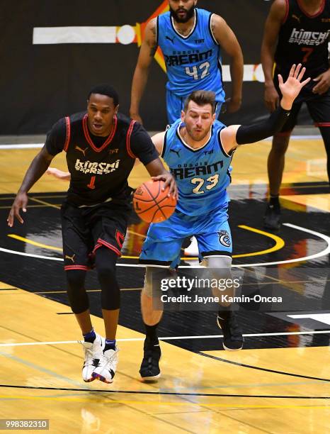 Sam Roselli of Dubois Dream chases down Marqueze Coleman of the Kimchi Express as he takes the ball down court during the game at Eagle's Nest Arena...