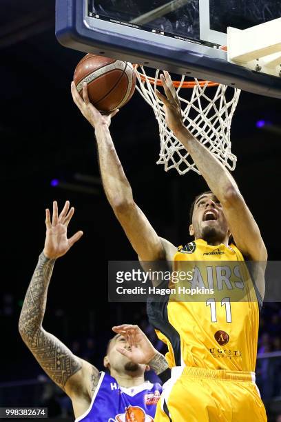 Xavier Smith of the Mountainairs goes up for a dunk during the NZNBL match between Wellington Saints and Taranaki Mountainairs at TSB Arena on July...