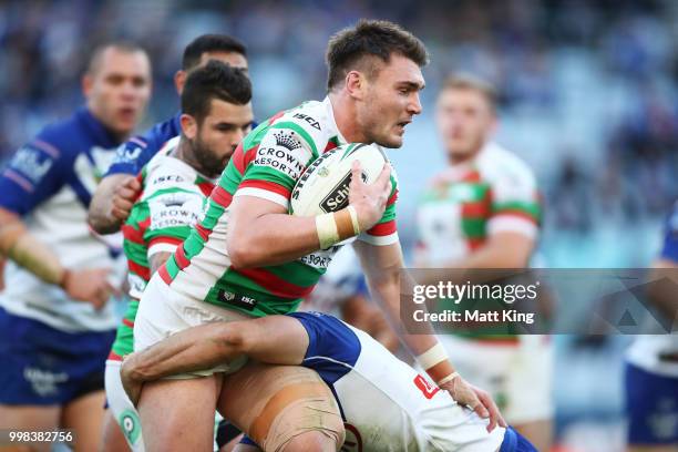 Angus Crichton of the Rabbitohs is tackled during the round 18 NRL match between the Canterbury Bulldogs and the South Sydney Rabbitohs at ANZ...