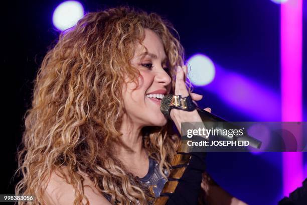 Colombian singer Shakira performs at the grand opening of the Cedars International Festival in northern Lebanon on July 13, 2018. / RESTRICTED TO...