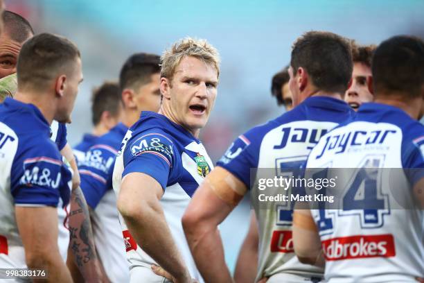 Aiden Tolman of the Bulldogs and team mates look dejected after a Rabbitohs try during the round 18 NRL match between the Canterbury Bulldogs and the...