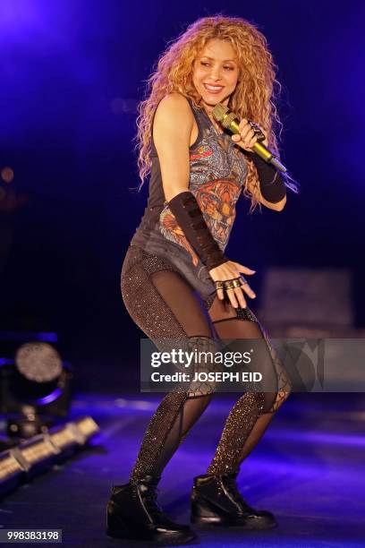 Colombian singer Shakira performs at the grand opening of the Cedars International Festival in northern Lebanon on July 13, 2018. / RESTRICTED TO...