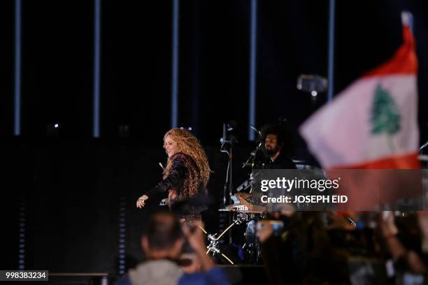 Colombian singer Shakira performs at the grand opening of the Cedars International Festival in northern Lebanon on July 13, 2018. / RESTRICTED TO...