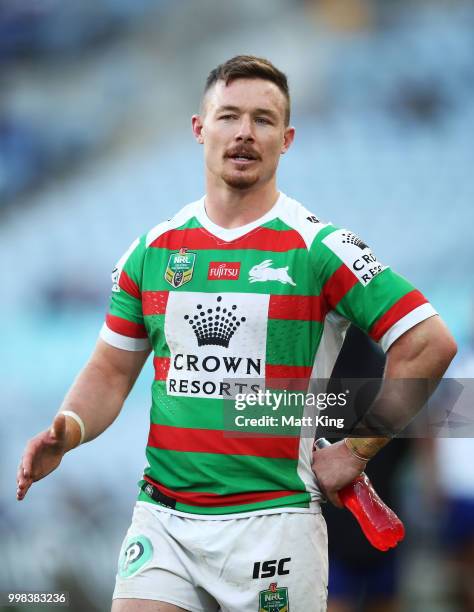 Damien Cook of the Rabbitohs looks on during the round 18 NRL match between the Canterbury Bulldogs and the South Sydney Rabbitohs at ANZ Stadium on...