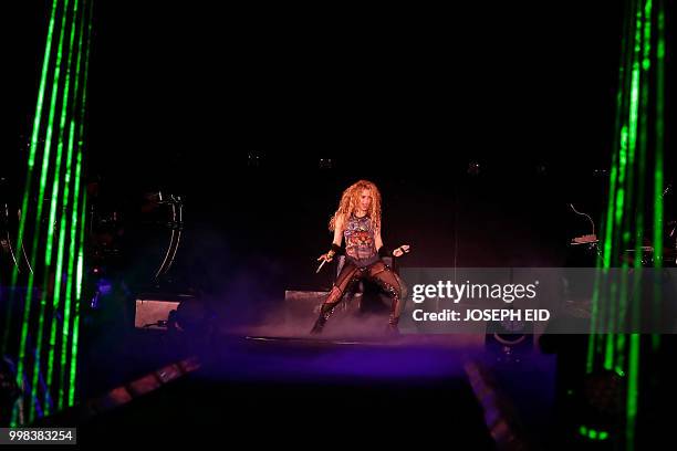 Colombian singer Shakira performs at the grand opening of the Cedars International Festival in northern Lebanon on July 13, 2018. / RESTRICTED TO...