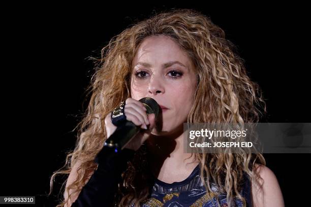 Colombian singer Shakira performs at the grand opening of the Cedars International Festival in northern Lebanon on July 13, 2018. / RESTRICTED TO...