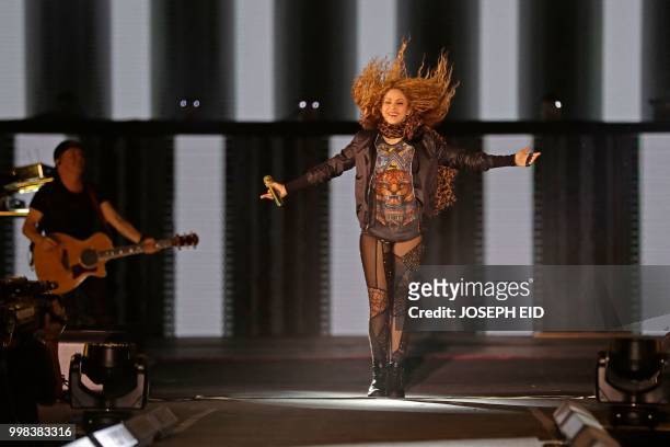 Colombian singer Shakira performs at the grand opening of the Cedars International Festival in northern Lebanon on July 13, 2018. / RESTRICTED TO...