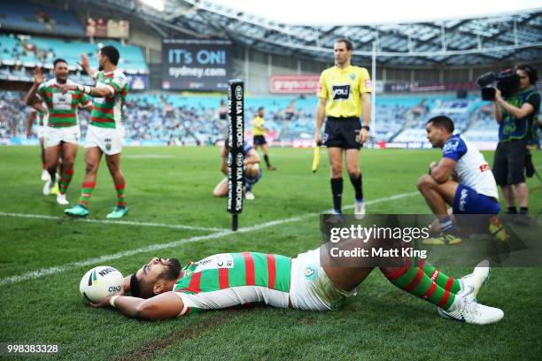 Robert Jennings of the Rabbitohs celebrates scoring a try during the round 18 NRL match between the Canterbury Bulldogs and the South Sydney...