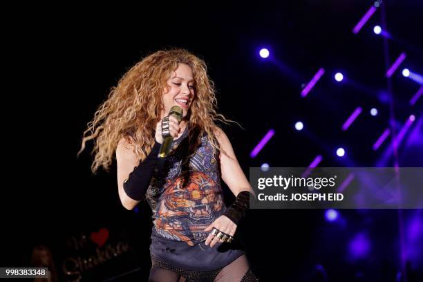 Colombian singer Shakira performs at the grand opening of the Cedars International Festival in northern Lebanon on July 13, 2018. / RESTRICTED TO...