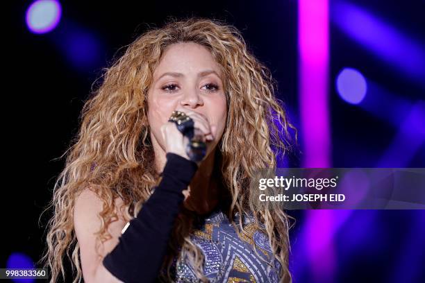 Colombian singer Shakira performs at the grand opening of the Cedars International Festival in northern Lebanon on July 13, 2018. / RESTRICTED TO...